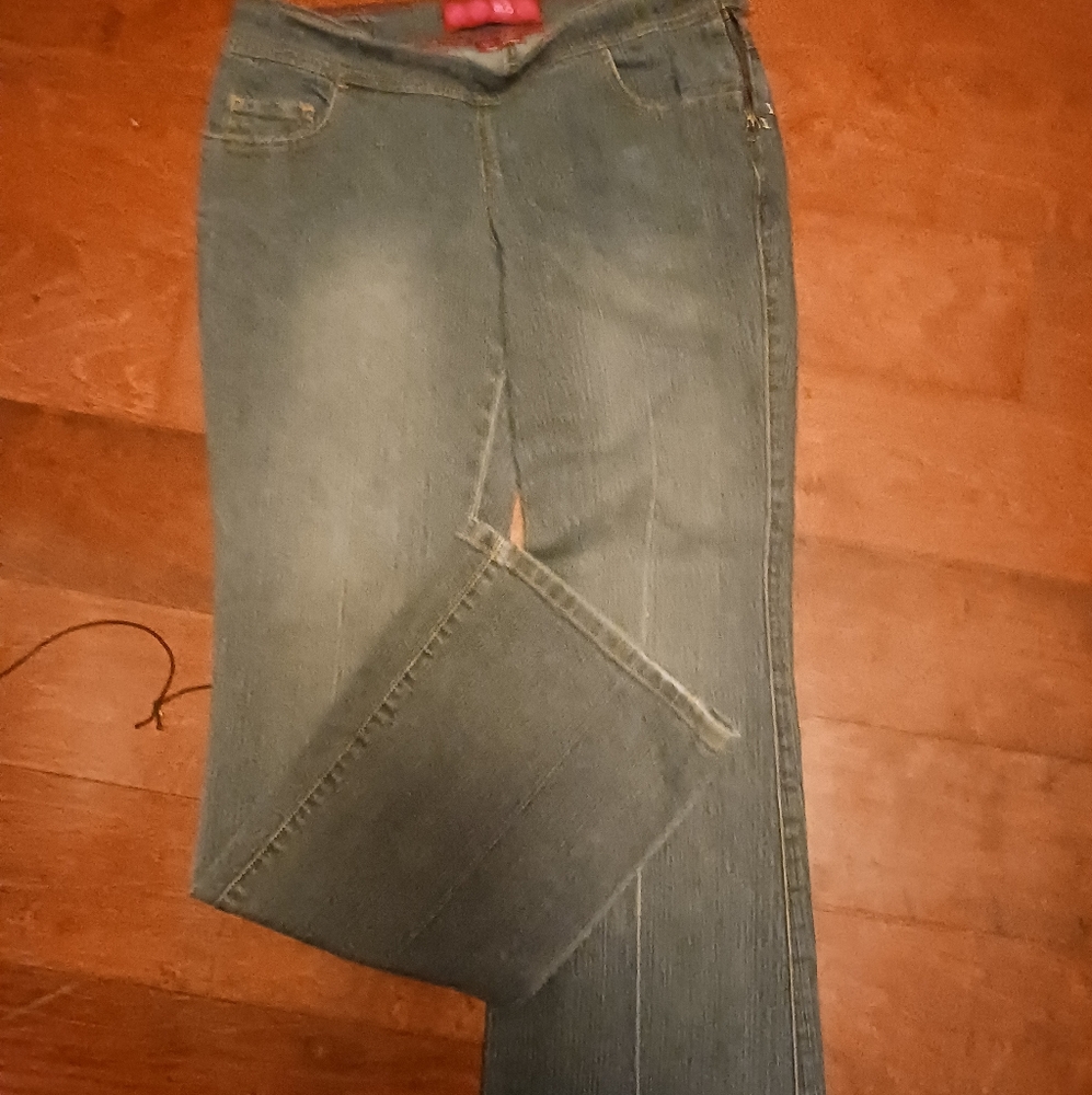 GLO Juniors jeans size 9 with zip up side with button.  They are flare legged